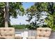 Rooftop view of trees and the city skyline in the distance with seating at 542 Orme Ne Cir, Atlanta, GA 30306