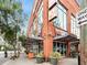 Charming street view of building with large windows, outdoor plants, and accessible sidewalks at 542 Orme Ne Cir, Atlanta, GA 30306