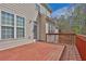 Wide shot of the deck with beige siding on the house at 705 Sunset Ridge Se Ln, Lawrenceville, GA 30045