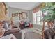 Inviting home office with a comfortable sitting area and a decorative animal print rug at 705 Sunset Ridge Se Ln, Lawrenceville, GA 30045