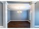 Dining room with hardwood floors, a decorative chandelier, and large white trim at 170 Shoal Park Dr, Mcdonough, GA 30252