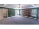 Large main bedroom with tray ceiling, wood accent wall and attached closet at 170 Shoal Park Dr, Mcdonough, GA 30252