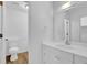 Clean bathroom featuring an expansive sink and toilet at 455 Tyson Cir, Roswell, GA 30076