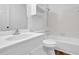 Clean bathroom with a shower-tub combo, white tile surround, and a single sink vanity at 455 Tyson Cir, Roswell, GA 30076