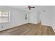 Bright, airy bedroom features neutral walls, and hardwood floors at 455 Tyson Cir, Roswell, GA 30076