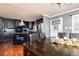 Eat-in kitchen featuring a decorative island, stainless steel appliances, hardwood floors, and ample counter space at 4960 Old Yorkville Rd, Dallas, GA 30157