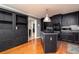 Eat-in kitchen featuring an island, stainless steel appliances, hardwood floors, and ample dark wood cabinetry at 4960 Old Yorkville Rd, Dallas, GA 30157