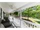 Relaxing porch with comfortable seating and scenic views of the surrounding landscape at 4960 Old Yorkville Rd, Dallas, GA 30157