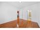 Bright bedroom featuring hardwood floors and neutral wall paint color at 2116 Gorman Se Grv, Atlanta, GA 30316