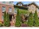 Charming townhome with brick and siding exterior, complemented by lush landscaping at 2116 Gorman Se Grv, Atlanta, GA 30316