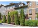 Charming townhome with brick and siding exterior and well-maintained landscaping offering curb appeal at 2116 Gorman Se Grv, Atlanta, GA 30316