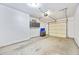 Spacious garage with storage cabinets and concrete flooring for organization and convenience at 2116 Gorman Se Grv, Atlanta, GA 30316