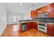 Well-equipped kitchen with granite countertops, stainless steel appliances, and a breakfast bar at 2116 Gorman Se Grv, Atlanta, GA 30316