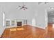 Bright living room featuring a fireplace with built-ins and hardwood floors at 2116 Gorman Se Grv, Atlanta, GA 30316