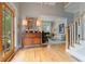 Inviting foyer with hardwood floors, natural light, and a view into the living room at 295 Sagamore Nw Cv, Sugar Hill, GA 30518
