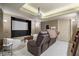 Basement home theater setup with projector and comfortable seating at 295 Sagamore Nw Cv, Sugar Hill, GA 30518