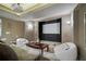Cozy basement home theater with a large screen and comfortable seating at 295 Sagamore Nw Cv, Sugar Hill, GA 30518