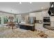 Beautiful kitchen featuring granite countertops, a kitchen island, stainless steel appliances and breakfast area at 295 Sagamore Nw Cv, Sugar Hill, GA 30518