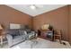 Comfortable living room with a plush sofa, elegant decor, and plenty of space for entertaining at 295 Sagamore Nw Cv, Sugar Hill, GA 30518