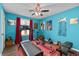Bright exercise room with cardio equipment, weights, and vibrant decor at 4695 Waters Rd, Woodstock, GA 30188