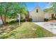 Charming two-story home with a well-manicured lawn and a two-car garage at 545 Goldfinch Way, Stockbridge, GA 30281