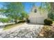 Two-car garage with long driveway and manicured landscaping surrounding the exterior of this lovely home at 545 Goldfinch Way, Stockbridge, GA 30281