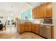 Bright kitchen featuring stainless steel appliances and a view to the backyard at 545 Goldfinch Way, Stockbridge, GA 30281