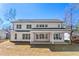 A sprawling backyard with a covered patio area perfect for outdoor entertaining and relaxation at 6091 Wayfarer Dr, Villa Rica, GA 30180