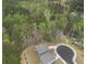 An aerial view captures a home near lush greenery, perfect for nature enthusiasts at 1037 Devon Dr, Acworth, GA 30102