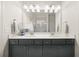 Modern bathroom featuring double sinks and ample lighting at 1037 Devon Dr, Acworth, GA 30102