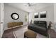 Stylish bedroom featuring modern furniture, cozy decor, and a comfortable bed with sleek bedding at 1037 Devon Dr, Acworth, GA 30102