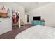 Bright bedroom featuring a walk-in closet and tv at 1037 Devon Dr, Acworth, GA 30102