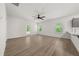 A large living room with hardwood floors and a ceiling fan at 1037 Devon Dr, Acworth, GA 30102