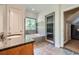 Bathroom featuring granite vanity, tiled floor, soaking tub, and walk-in shower at 1714 Parkhill Dr, Decatur, GA 30032