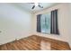 Bright and airy bedroom features wood-look floors and a ceiling fan at 1714 Parkhill Dr, Decatur, GA 30032