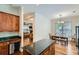 Open dining area with hardwood floors and a view of the living room and kitchen at 1714 Parkhill Dr, Decatur, GA 30032