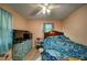 Bedroom with hardwood floors, ceiling fan, and natural light at 5955 Kemp Dr, Acworth, GA 30102