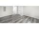 Bedroom with durable flooring and an inviting open doorway at 5955 Kemp Dr, Acworth, GA 30102