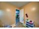 Hallway with hardwood floors leading to the rest of the home at 5955 Kemp Dr, Acworth, GA 30102