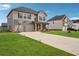 Charming two-story home with a two-car garage and well-manicured lawn at 89 Cowpen Ct, Covington, GA 30014