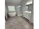Spacious bathroom featuring a soaking tub, shower, and modern vanity at 9450 Knollcrest Blvd, Alpharetta, GA 30022