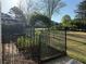 A well-tended garden area featuring an archway with climbing plants at 9450 Knollcrest Blvd, Alpharetta, GA 30022
