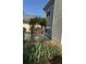 A charming garden area with an archway, flowering plants, and a vegetable garden at 9450 Knollcrest Blvd, Alpharetta, GA 30022