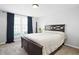 Bright bedroom with a large window and comfortable furnishings at 4307 Orchard Park Ct # A, Stone Mountain, GA 30083