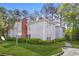 Inviting condo complex featuring manicured lawns and lush landscaping at 4307 Orchard Park Ct # A, Stone Mountain, GA 30083