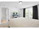 Well-lit main bedroom features a fireplace and neutral decor at 4307 Orchard Park Ct # A, Stone Mountain, GA 30083