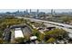 Aerial view of property and surrounding area, including the Atlanta skyline and a train at 791 Wylie Se St # 1111, Atlanta, GA 30316