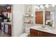 Modern bathroom boasts granite countertops, open shelving, and stainless steel appliances at 791 Wylie Se St # 1111, Atlanta, GA 30316