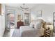 Bright bedroom with a ceiling fan, and outdoor access at 791 Wylie Se St # 1111, Atlanta, GA 30316