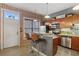 The kitchen features stainless steel appliances, a breakfast bar, and brick accents at 791 Wylie Se St # 1111, Atlanta, GA 30316